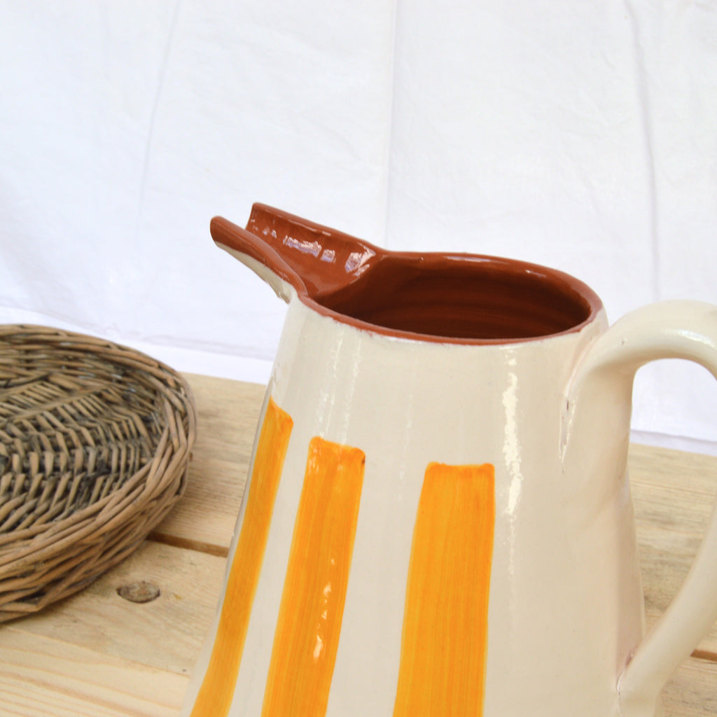 terracotta striped jug yellow