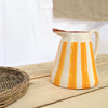 terracotta striped jug yellow